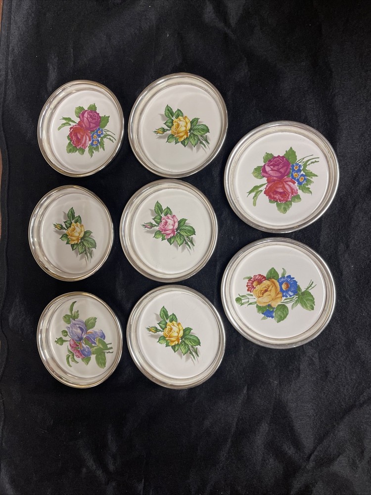 Rogers silver Company coasters with floral display