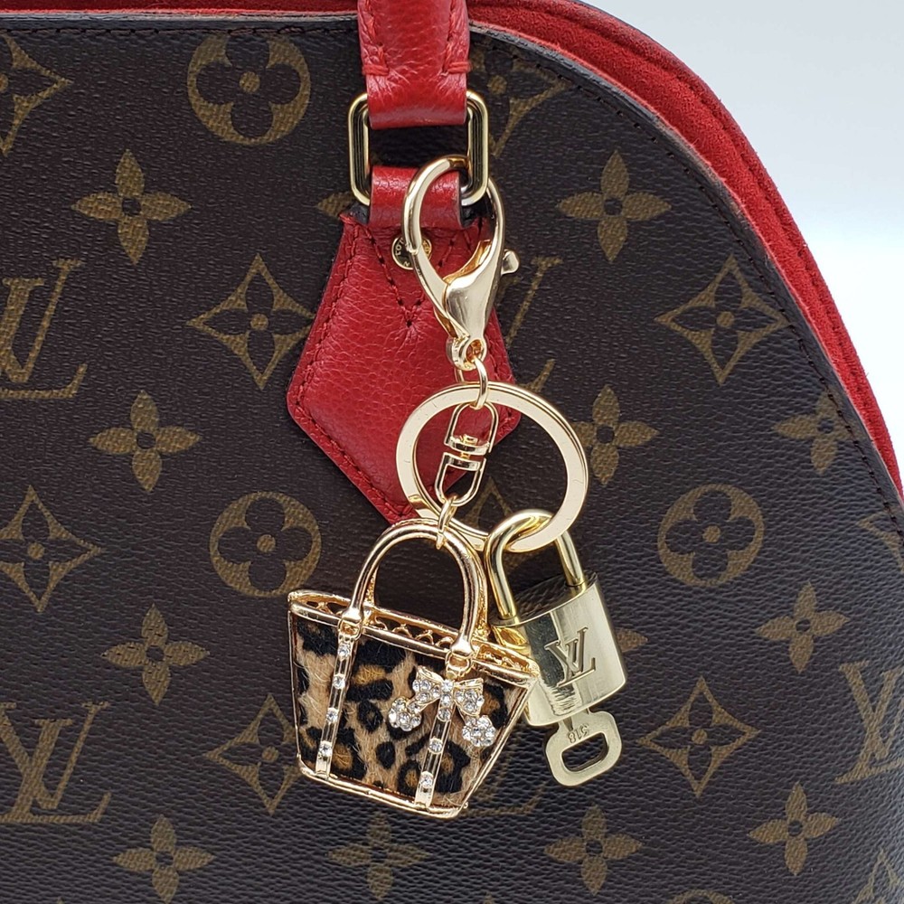 100% Auth Louis Vuitton Lock & Key with unbranded Bagcharm, Keycharm, Keychain