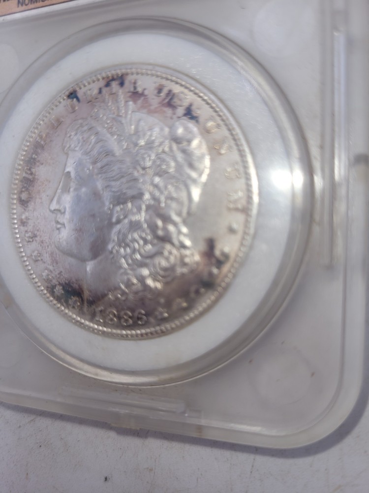1886 Morgan Silver Dollar – Mint State – 90% Silver – Encapsulated
