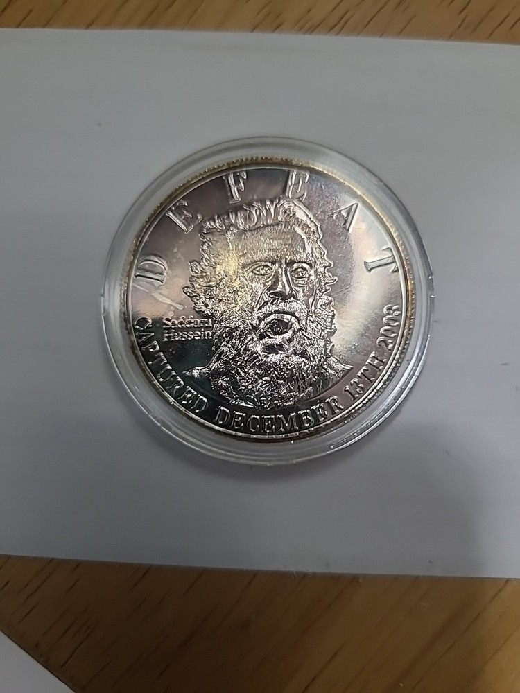 Bush Hussein Victory Coin