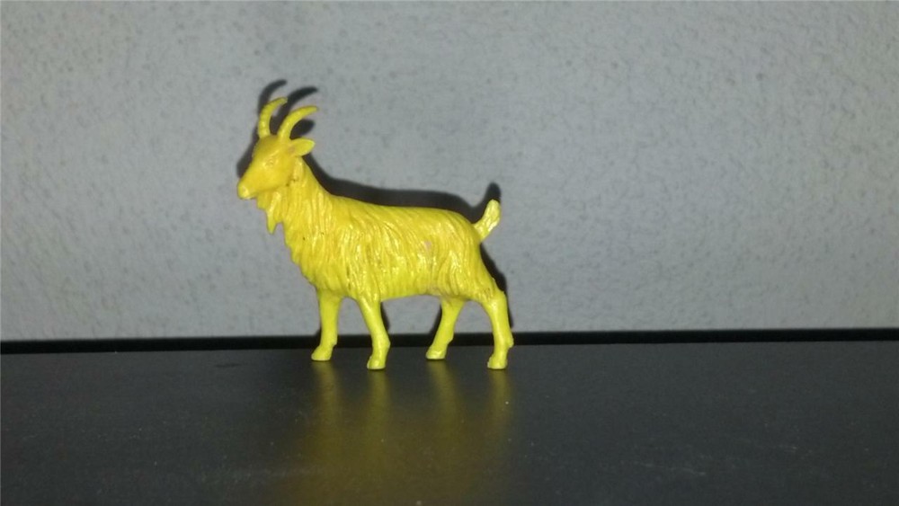 Processed Plastic Goat   in Yellow Soft Plastic.  No Base