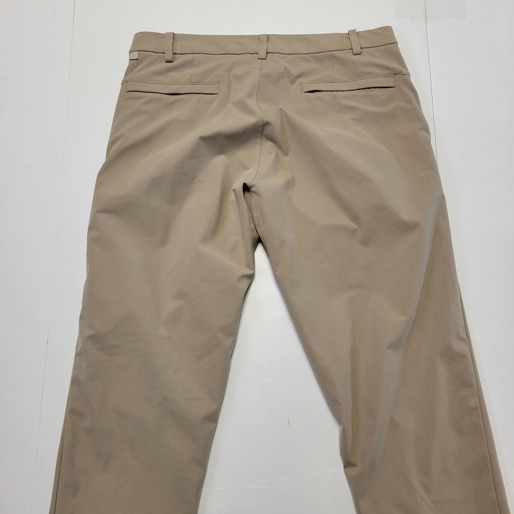 LULULEMON Commuter Pants Men's 34x33 Beige Polyester Flat Front Performance 34