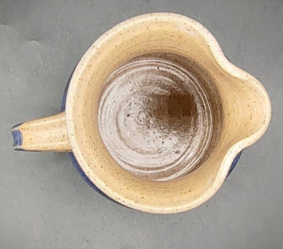 Hand Spun Brown And Blue Pottery Pitcher Signed
