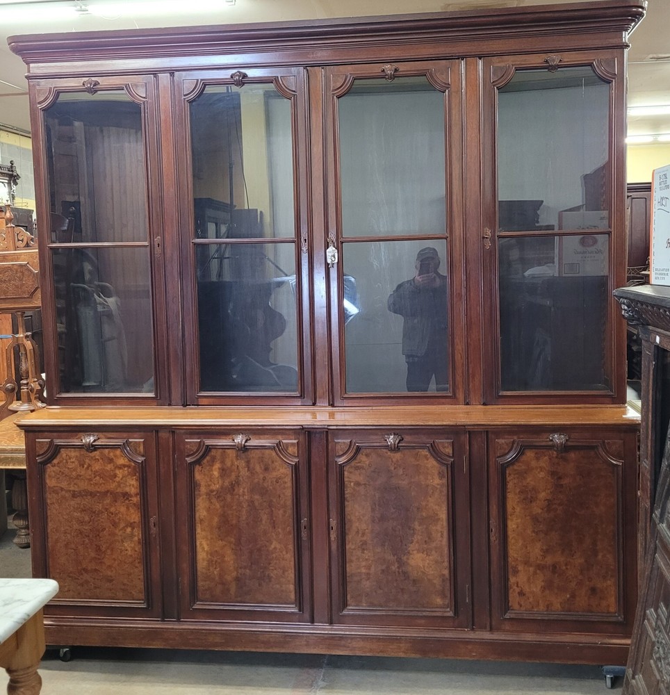 EXCEPTIONAL AMERICAN VICTORIAN WALNUT AND BURL BOOKCASE
