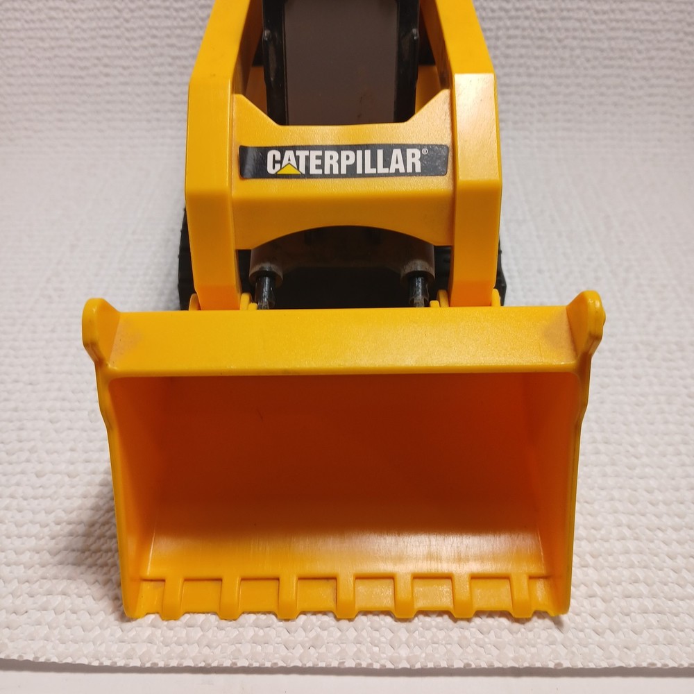 Caterpillar (CAT) toy skid steer loader, likely a "Big Builder". UNTESTED