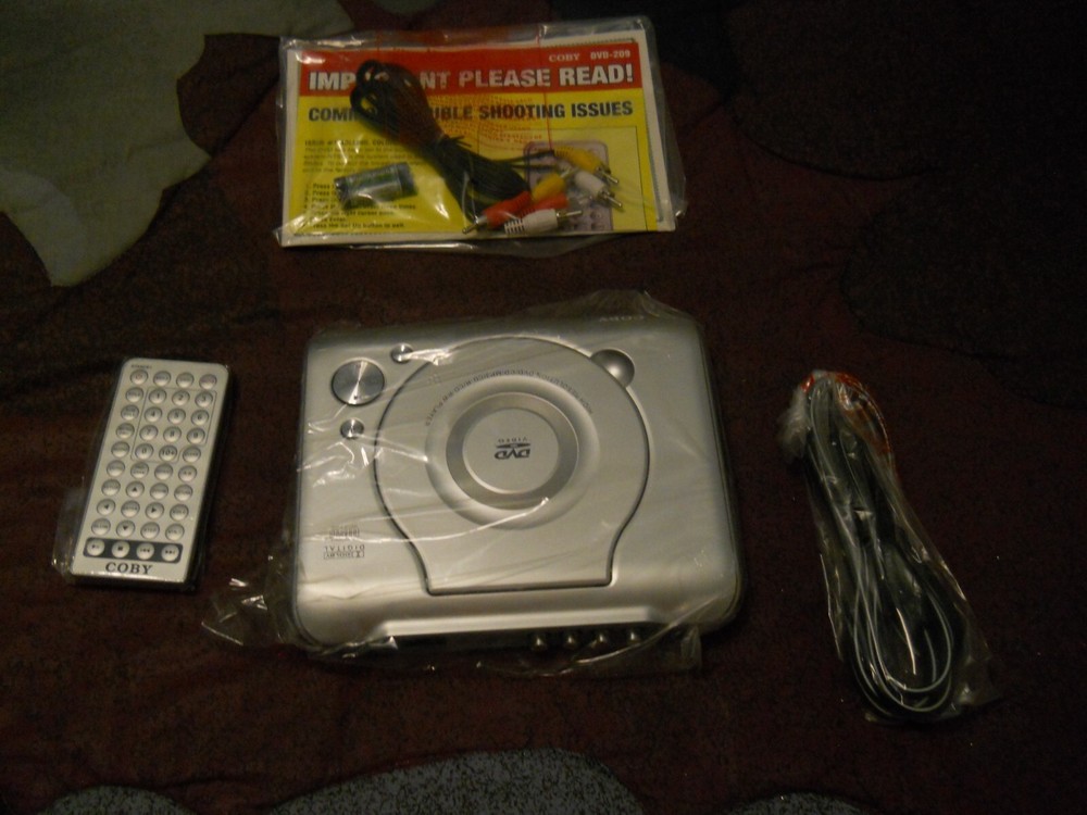 NEW ~ Coby DVD-209 Ultra Compact DVD Player.