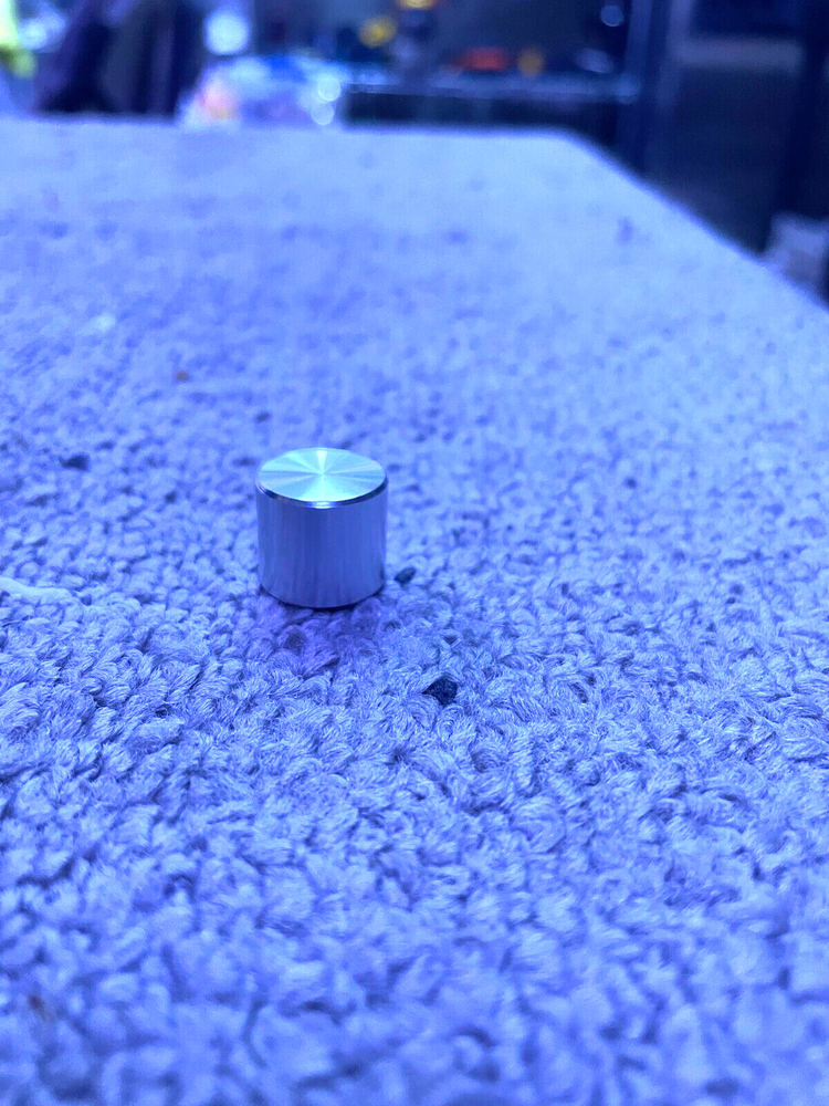 Vintage Marantz 1060 amplifier front panel push knob.