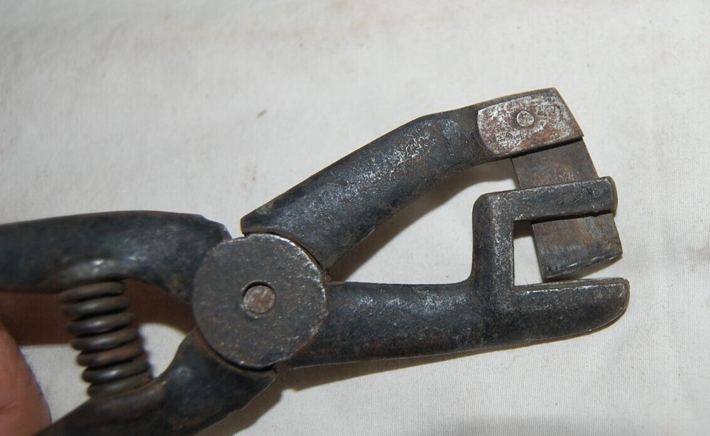 Unusal Antique Spring Loaded Iron Crimper ?