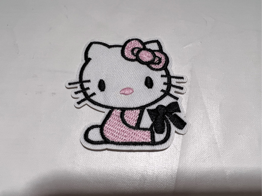 Hello Kitty with a Black Bow Iron on Patch
