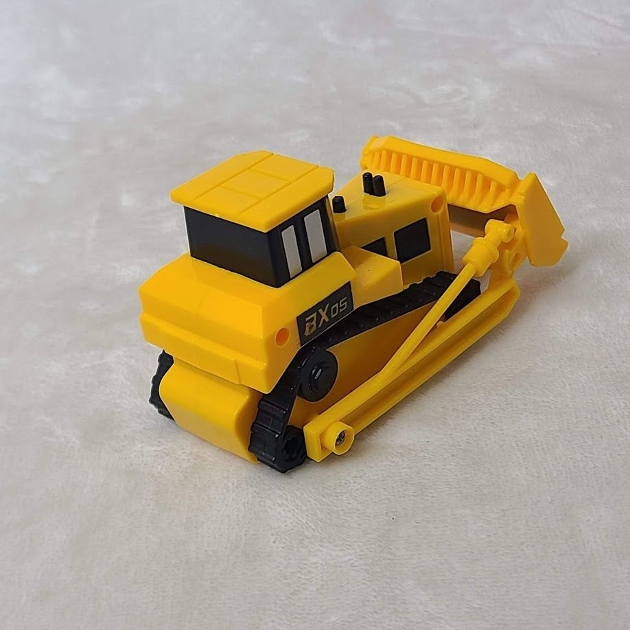 Yellow Plastic Toy Bulldozer With Movable Front Blade