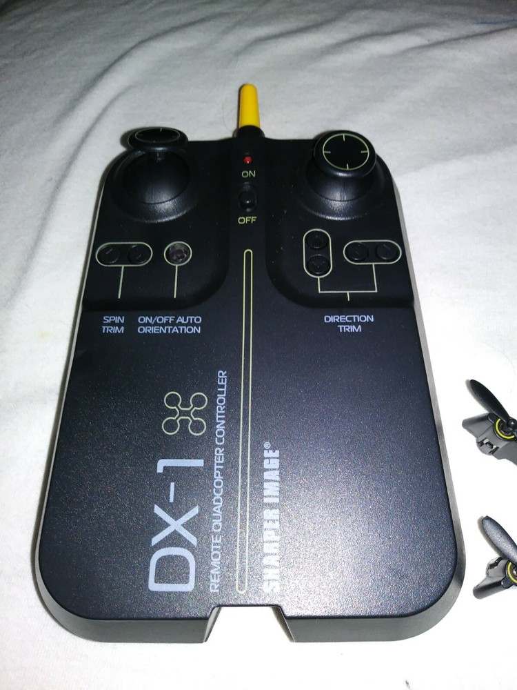 2 Sharper Image DX-1 Remotes Controllers Plus Micro Drone For Parts Not Tested