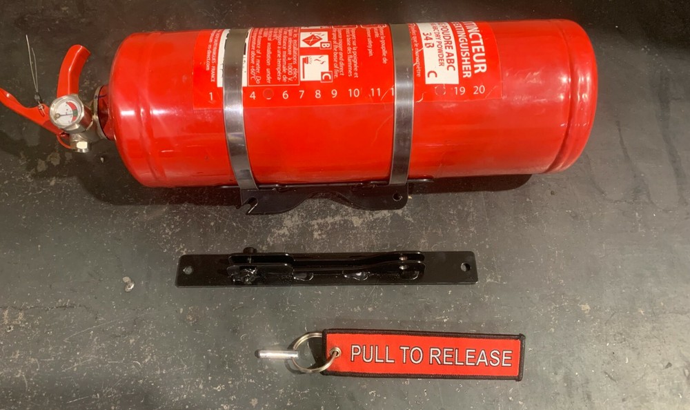 F4 Fabrication Quick release fire extinguisher bracket