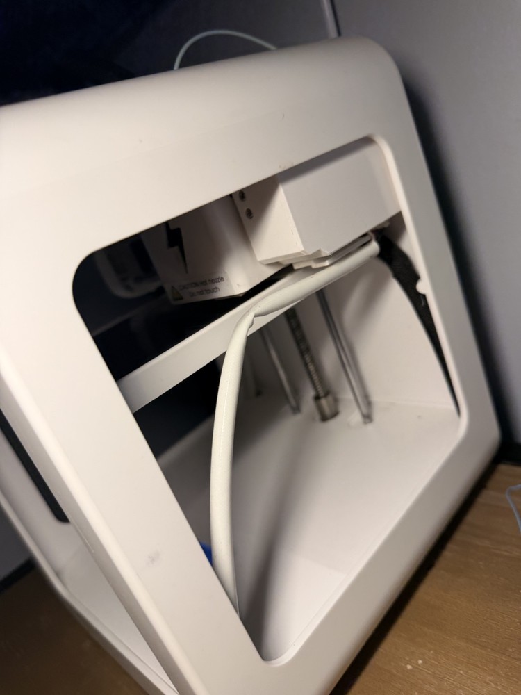 toybox 3d printer alpha 2 with power cable and accessories.