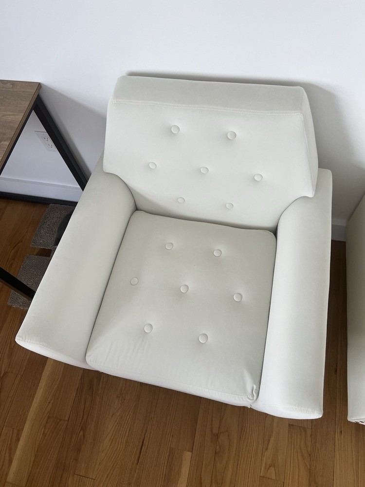 White quilted fabric armchair