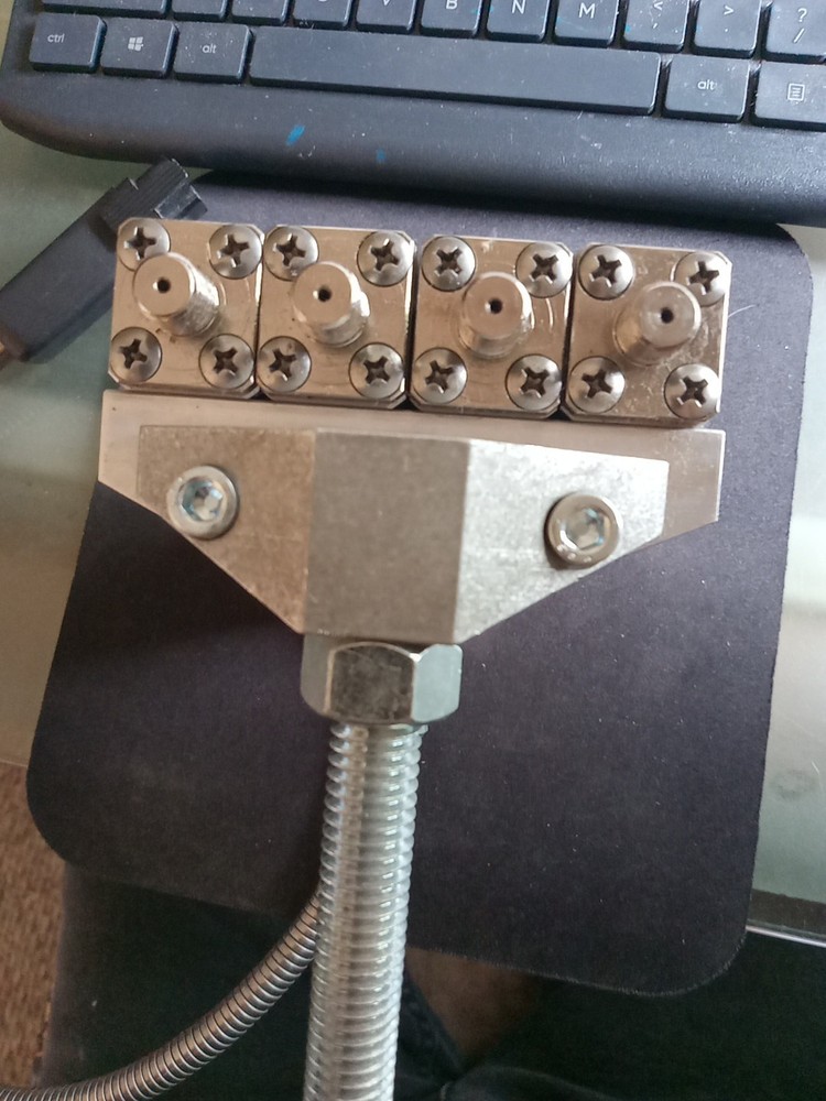 Zents / Nordson Applicator Head.