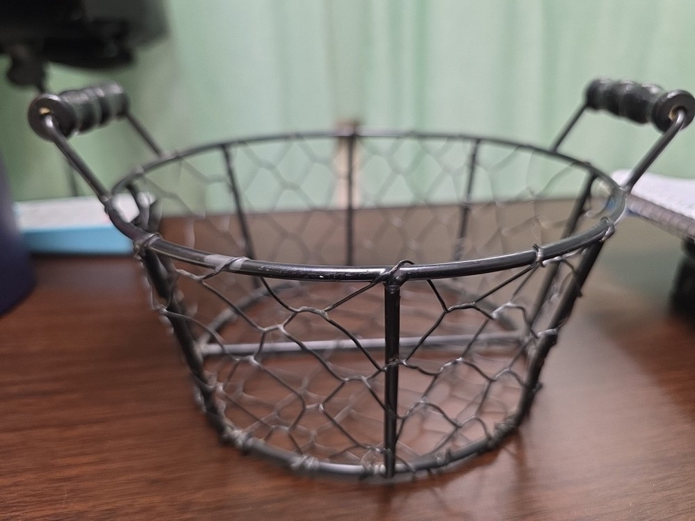 Chicken wire style basket. Wood handle. Size medium. Home decor. Easter.