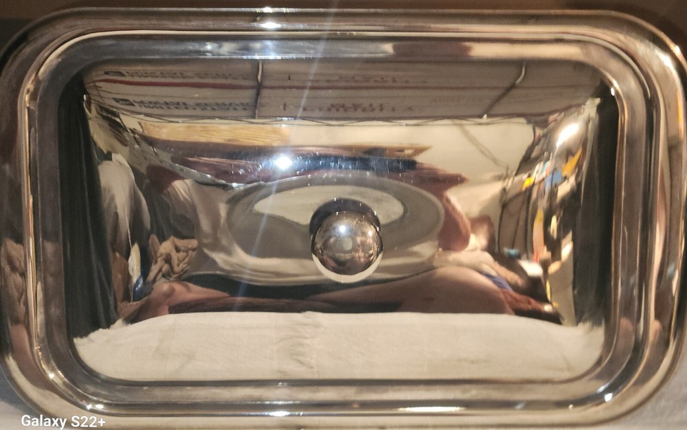 Pre-owned unknown rectangular silver-plated magnetic Lid with rounded corners.