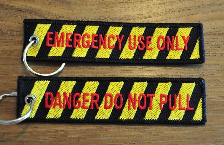 EMERGENCY USE ONLY - DANGER DO NOT PULL embroidered keychain