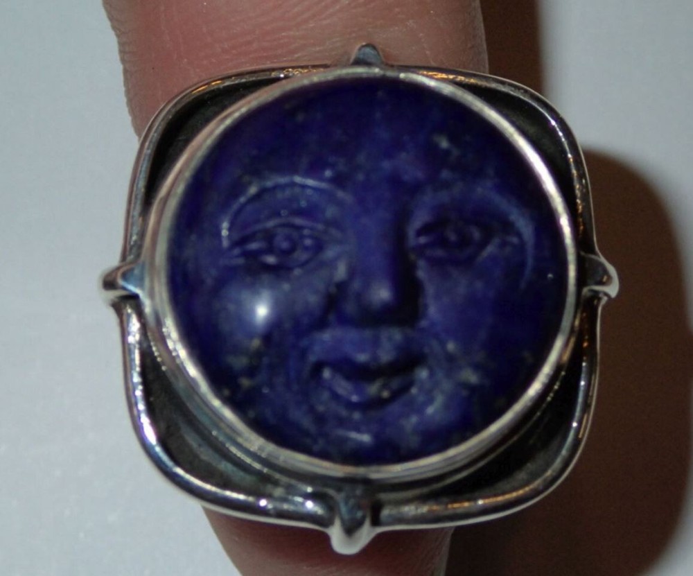Sterling Silver Ring with Lapis carved Face. adjustable