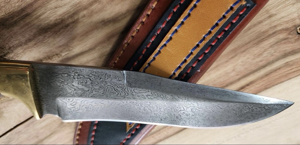 Hand Forged Skinner Damascus Steel Knife- A Multi Functionality Craftmanship
