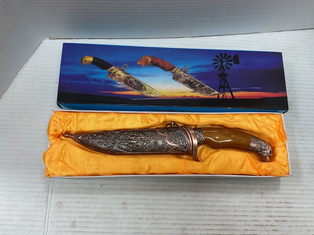 dagger with sheath gold color and eagle design