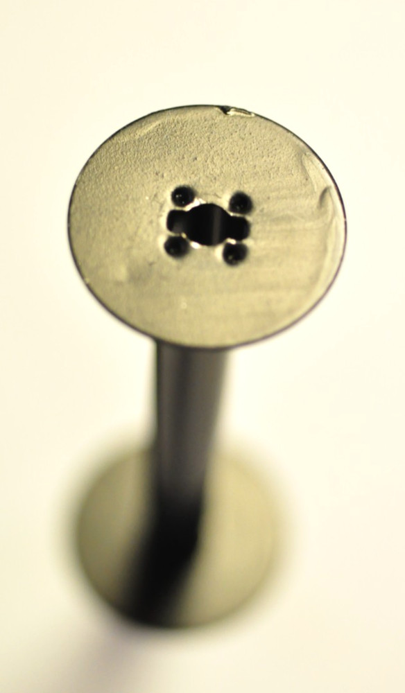 Size 620 empty black metal film spool.