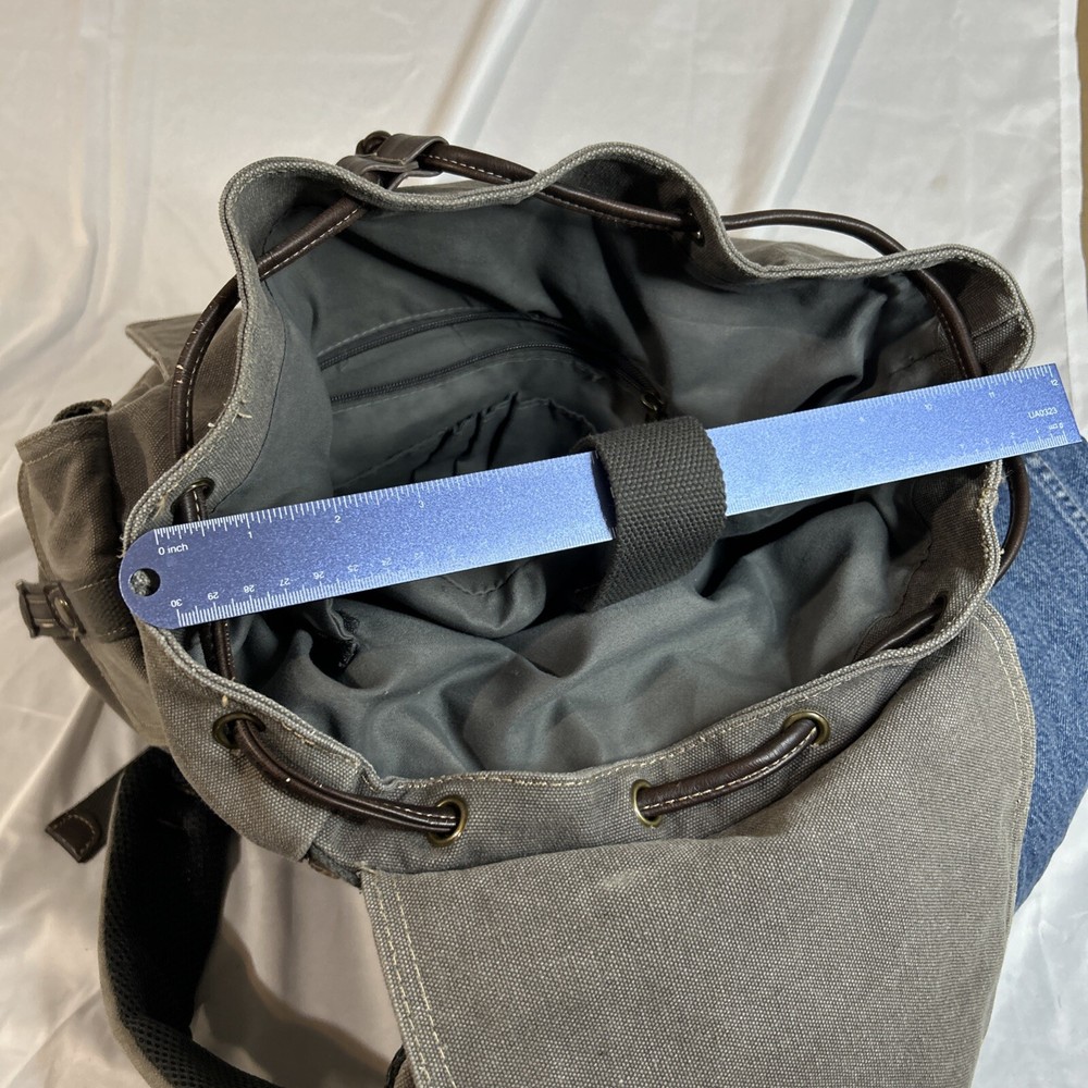 Cargoit Gray Canvas Backpack Magnetic Closures Pockets Straps and A Deep Inside