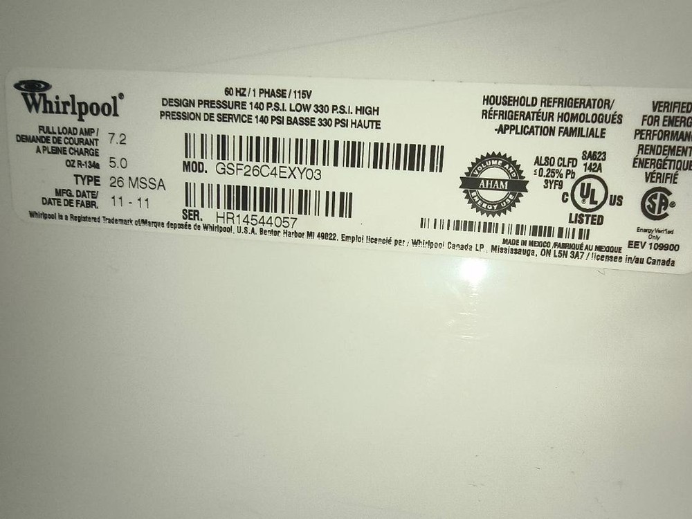 Whirlpool side by side refrigerator /freezer