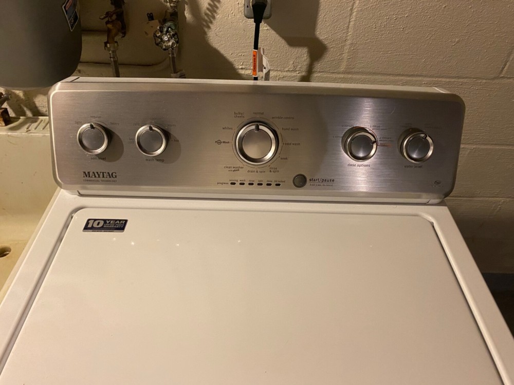 Lightly used white Maytag top load washing machine/ front load dryer