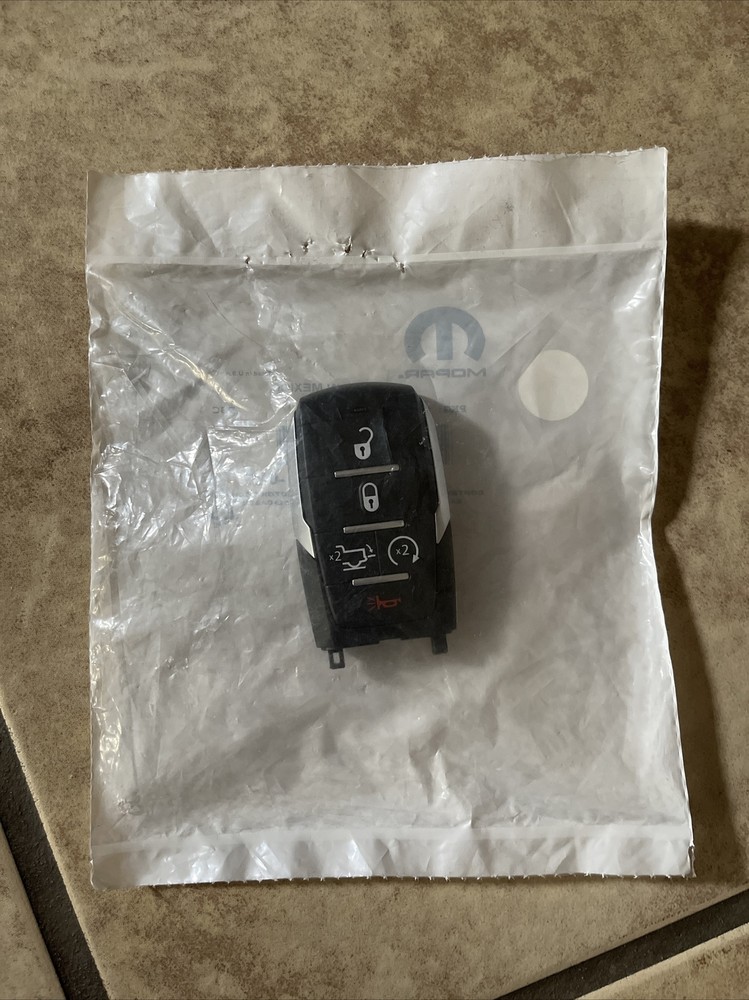 Genuine Mopar Integrated Key Fob Transmitter 68575604AA
