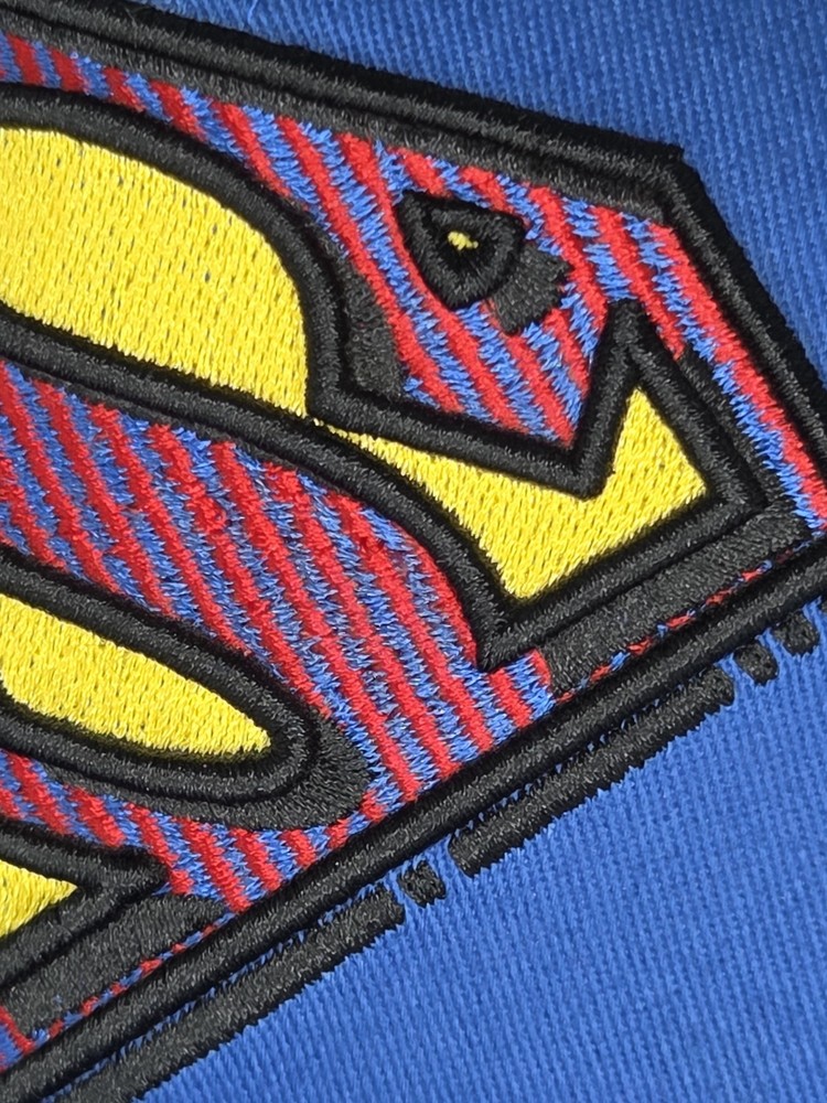DC Comics Superman Side Panel Logo New Era Snap Back Flat Bill Embroidered