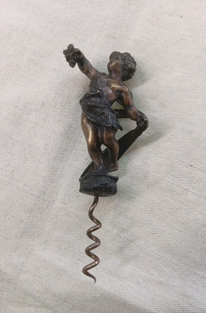 COLLECTABLE BRONZED CORKSCREW WITH WINGED CHERRUB HANDLE