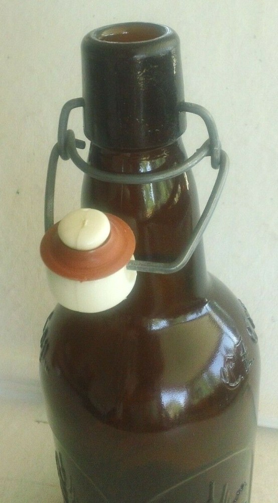 One E-Z Cap Amber 16 Ounce Bottle with Embossed Pattern on Side