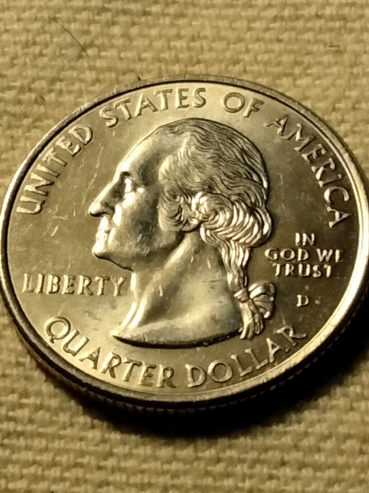 1999 D State Quarter Misaligned Die Struck Thru Grease