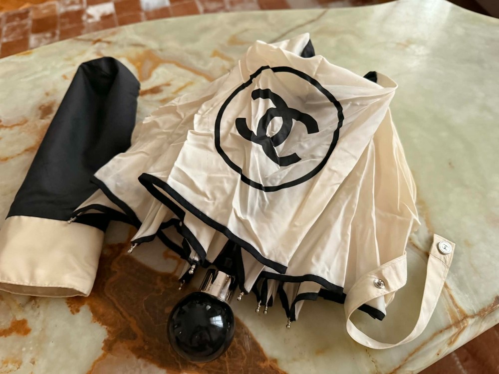 Rare vintage authentic Chanel umbrella – chic statement piece