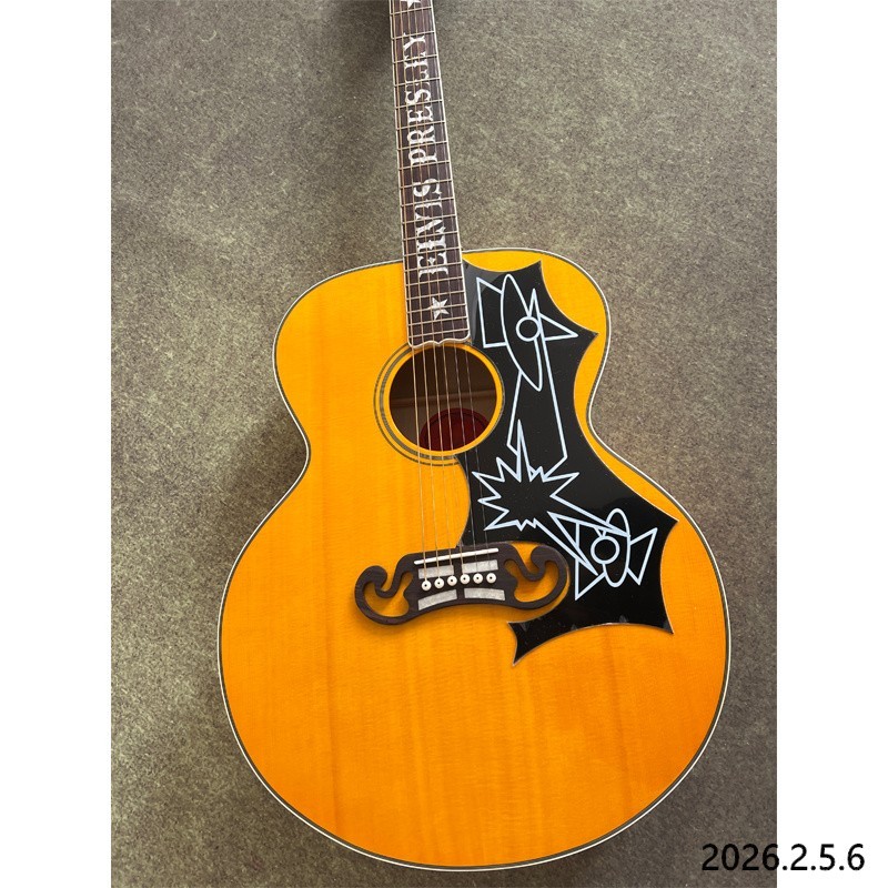 Acoustic guitar yellowish Solid spruce board top maple back and side