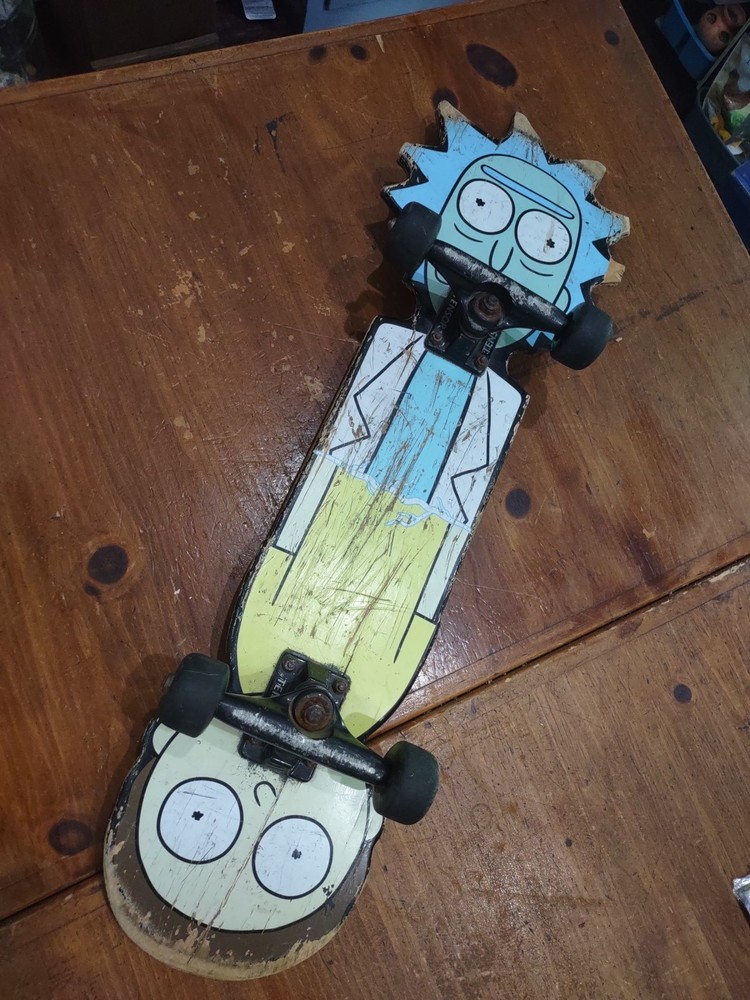 Rick and Morty Skateboard Shaped Deck Primitive.  (scratches) Poor Condition