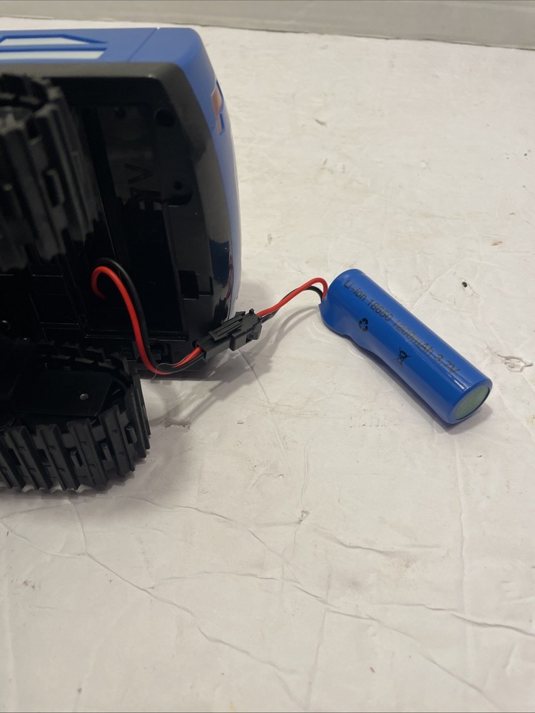 Coplus Remote Control Back Loader. Works great. No charger for tractor itself ￼