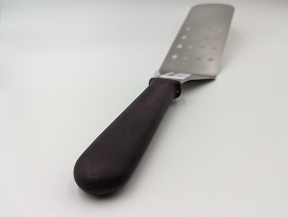 Update International 10" x 3" Perforated Turner w/ Plastic Handle