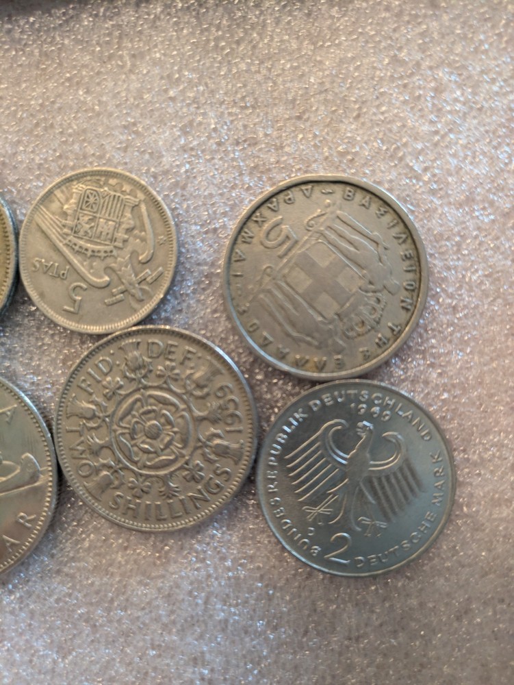 10 misc vintage foreign coins