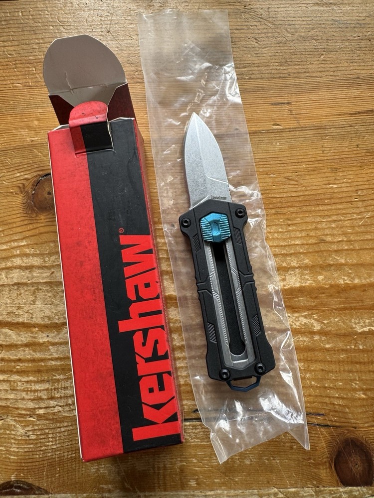 Kershaw Kapsule Manual Open Sliding Button Lock Single Edge Spear Point Blade