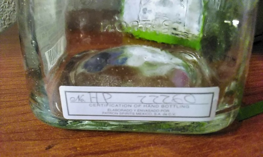 Silver Patron Bottle With Handwritten Number