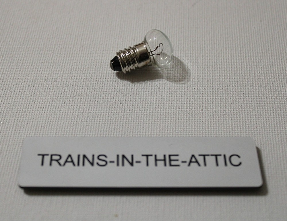 LIONEL 706 CLEAR 14 VOLT FLAT FACED SCREW BASE BULB