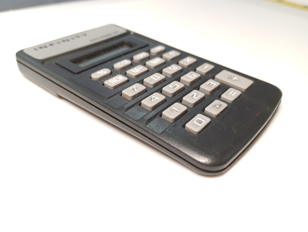 Vintage Infinity Personal Desktop Calculator with original box untested