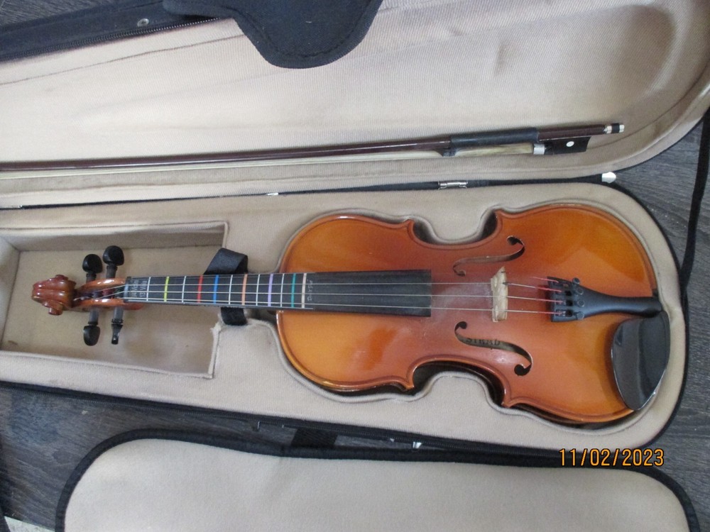 Violin with case and bow,  3/4  size.