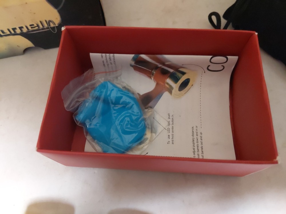 Zhumell Covent Binoculars Ruby W/ Original Box and Instructions