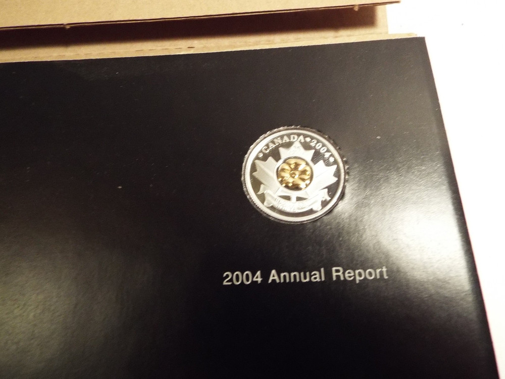 2004 Canada RCM Annual Report with Quarter.