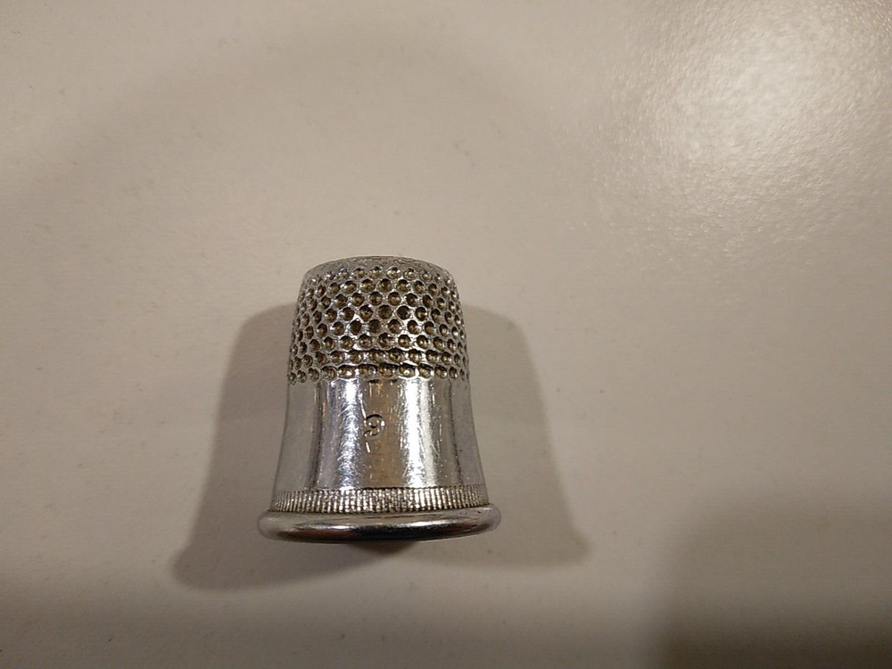 ANTIQUE SEWING THIMBLE AND BUTTON LOT
