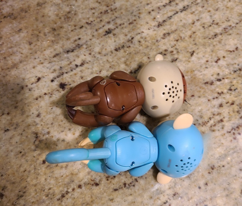 2 Fingerlings Interactive Baby Monkey Blue Brown Toys. Both work tested.