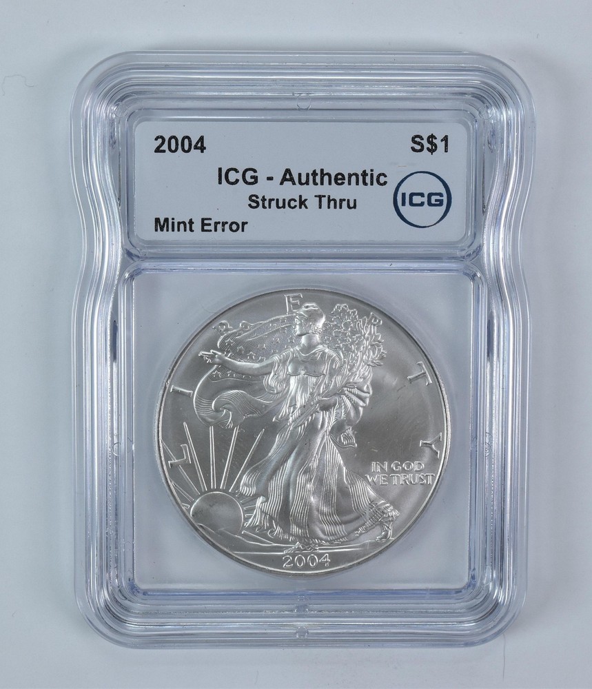 2004 American Silver Eagle Mint Error Struck Thru Authentic ICG